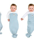 Baby in Adjustable Baby Swaddle For Newborns That Feels Like The Womb Pediatrician Recommended Safe Sleep Solution with arms out
