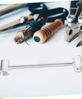 Door Hinge Gap Adjuster Kit for Precise Alignment and Easy Repair Universal Hinge Fix Tool Set with Heavy Duty Wrench shown on a workbench.