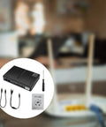 Portable Mini UPS Backup Power Supply For Routers And Wifi Modems 5V 9V 12V Outputs shown with accessories and screwdriver.