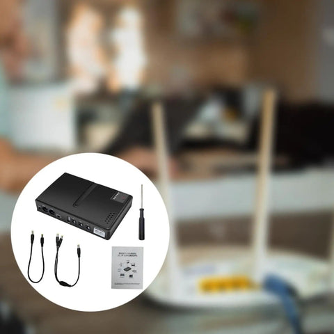 Portable Mini UPS Backup Power Supply For Routers And Wifi Modems 5V 9V 12V Outputs shown with accessories and screwdriver.