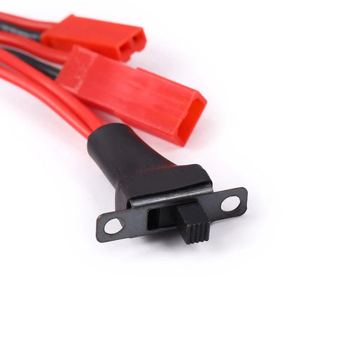 Close-up of switch component for 20A RC ESC Motor Speed Controller With Forward Reverse Brake And 2kHz PWM, red connectors visible