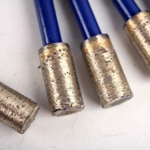 Close-up of Five-Piece Sintered Diamond Burr Set With One Quarter Inch Shank For Granite Marble Quartz Engineered Stone Rotary Carving