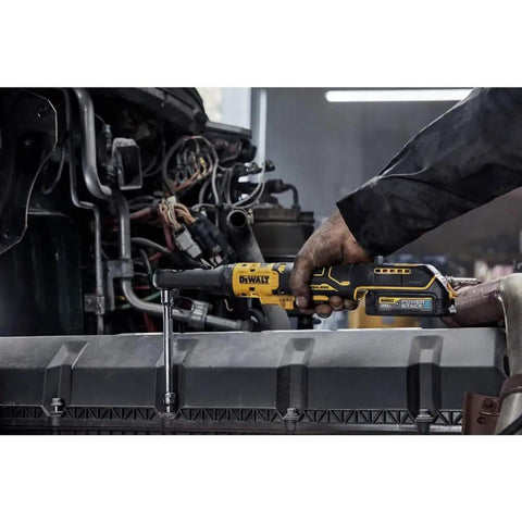 Mechanic using Cordless 20V Max XR Ratchet With Interchangeable Three Eighths Inch And One Half Inch Drives Sealed Head Brushless Motor