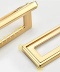 Concealed Clamshell Drawer Pulls Kit With Screws shown in a gold finish, highlighting rectangular recessed cabinet handles made of zinc alloy.