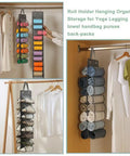 Top Tier Hanging Closet Organizer With Twenty Six Pockets For Leggings And Tees Plus Double Sided Oxford Fabric Rack in closet.