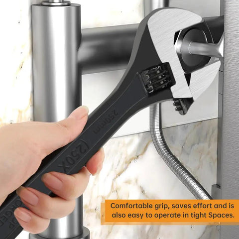 Ridiculously Handy 3-Piece Adjustable Wrench Set With 6, 8, And 10 Inch Wide Jaw in use on plumbing pipe