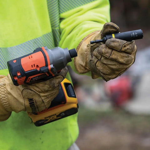 Person holding a 20V Battery Powered Impact Driver With One Quarter Inch Hex Quick Connect 210 Foot Pounds Max Torque Brushless Motor Compact Design