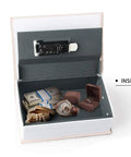 Inside view of Small Diversion Book Safe Storage Box with Hidden Compartment, showing cash, watch, jewelry, and lock.