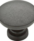 Close-up of a Fulton Soft Iron Round Cabinet Knob 30 mm, rugged textured finish for drawers or cabinets, Franklin Brass.