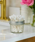 Wide Mouth Quilted Crystal Jelly Jars With Lids And Bands For Canning, Juices, Quarter Pint Size, Pack Of 6 on bathroom counter