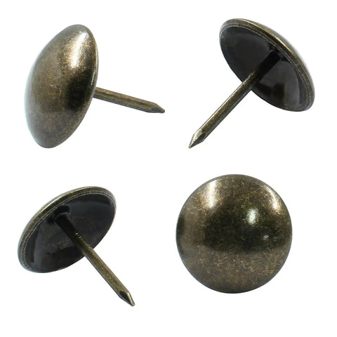 Top Shelf Bronze Upholstery Tacks 3/4 Inch Metal Furniture Pins for Chair Repair and Sofa Restoration, three bronze pins angled.