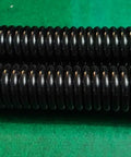 Set Of Two Tough As Nails Extension Springs Four Mm Wire One Inch Outer Diameter Twenty Inch Length, showing black steel construction.