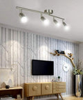 Sleek Modern LED 4-Light Track Lighting Kit With Flush Mount for wall or ceiling illuminating a living room with adjustable spotlights.