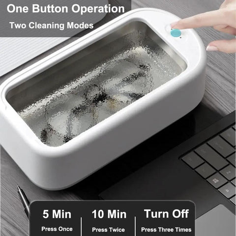 All In One Ultrasonic Glasses And Jewelry Cleaner 640ML 48KHz Powerful Sonic Cleaning Machine in operation near a laptop