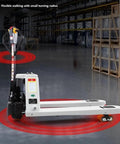 Heavy Duty Manual Pallet Jack With 1500 Kg Capacity showing flexible walking and small turning radius in a warehouse environment.