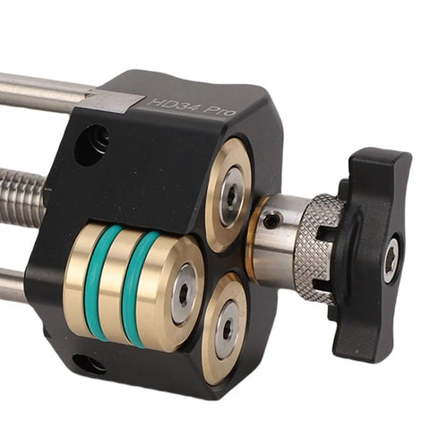 Pro Level Chisel Sharpening Jig With Adjustable Angle Ruler And Secure Clamps For Five To Seventy Millimeter Blades close-up of mechanism with aluminum and brass components.