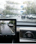 Four Piece Backup Camera Rain Shields For Tesla Cybertruck installed over rear camera, enhancing visibility in driving rain.