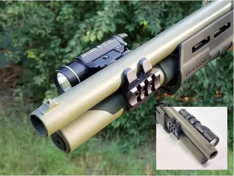 Rugged Shotgun Barrel Clamp Mount With Rubber Pads For 12 Gauge Guns attached to a shotgun with flashlight installed.