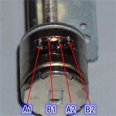 Close-up of Slick 10mm Lead Screw Stepper Motor Built Tough 2 Phase 4 Wire, showcasing metal connector details.
