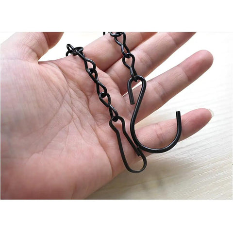 Close-up of black heavy duty hanging chains held in a hand, showing 10 Pack 9.5 Inch Black Heavy Duty Hanging Chains For Easy Outdoor Garden Plant Hangers Bird Feeders Baskets Planters Lanterns Wind Chimes And Decorative Ornaments For Outdoor Decor.