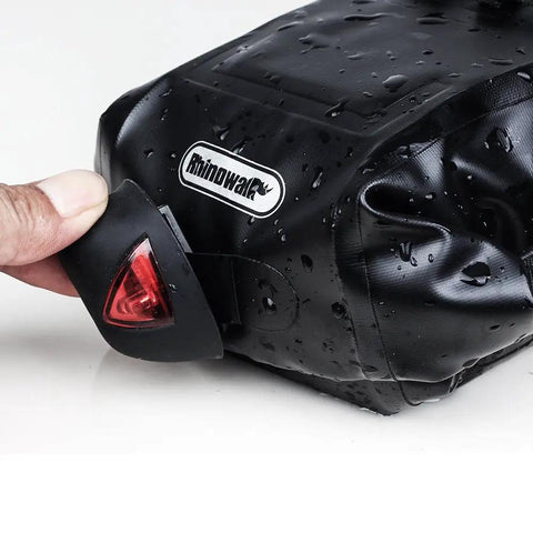 Waterproof Under Seat Saddle Bag For Bike With 1.5L Capacity, showing quick-release light mount on rainproof material