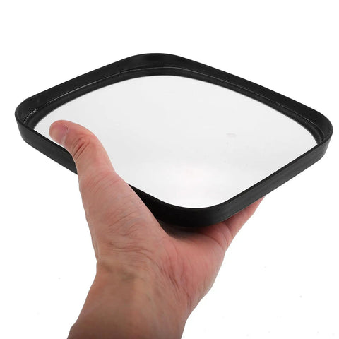 Wide Angle Convex Safety Mirror For Warehouse Parking Garage Driveway Blind Spot Coverage Beat Up Resistant Shell held by hand.