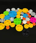 50Pcs Plastic Belt Pulleys Set For RC Cars, Trucks, Boats, Drones And Robots, multicolored assorted pulleys on black background