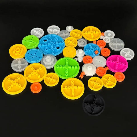 50Pcs Plastic Belt Pulleys Set For RC Cars, Trucks, Boats, Drones And Robots, multicolored assorted pulleys on black background