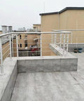 Heavy Duty 304 Stainless Steel Cable Railing Posts Built Tough Adjustable Deck Balusters Weather Ready Metal Railing System on rooftop.