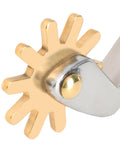 Close-up of brass swing button on stainless steel horse spurs for men and women, rustproof boot spurs, equestrian gear for riding.