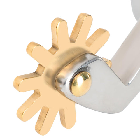 Close-up of brass swing button on stainless steel horse spurs for men and women, rustproof boot spurs, equestrian gear for riding.