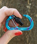 Heavy Duty Micro Carabiner With Keylock Screwlock And Captive Eye for Hella Secure Accessory Attachment, held in hand.