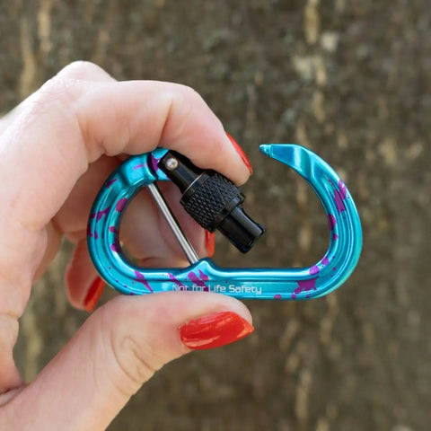 Heavy Duty Micro Carabiner With Keylock Screwlock And Captive Eye for Hella Secure Accessory Attachment, held in hand.