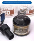 Next Level Panel Wash Liner Fluid bottle open with lid removed, showing deep black enamel ready for weathering model kits, 40ml size.