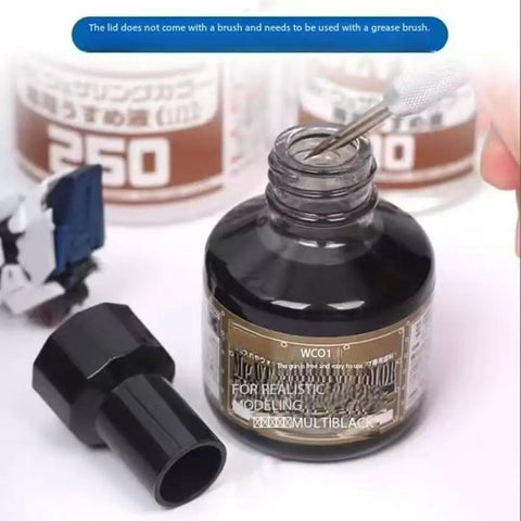 Next Level Panel Wash Liner Fluid bottle open with lid removed, showing deep black enamel ready for weathering model kits, 40ml size.