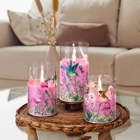 Pink Hummingbird Floral Glass Flameless Candles With Remote Timer Flickering Battery LED Pillar Candles Set Of 3 on table