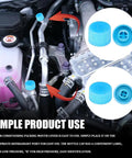 Keep Things Chill Under The Hood With These Tight Sealing Car AC Valve Caps Crafted For R134a Systems, showing blue caps on refrigerant ports.