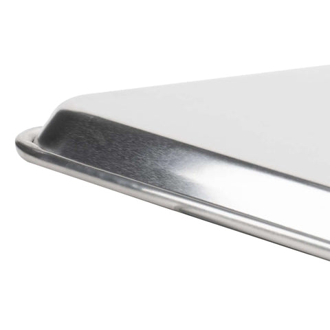 Close-up of Commercial Grade Aluminum Sheet Pan With Large Flat Baking Surface Two Thirds Size 18 Gauge Reinforced Rim Closed Bead