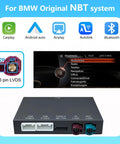 Wireless CarPlay Android Auto Retrofit Kit Decoder Box For BMW NBT System with multimedia screen and connectors visible.
