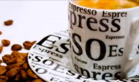 Close-up of an espresso cup and saucer with coffee beans, featuring espresso-themed text design.