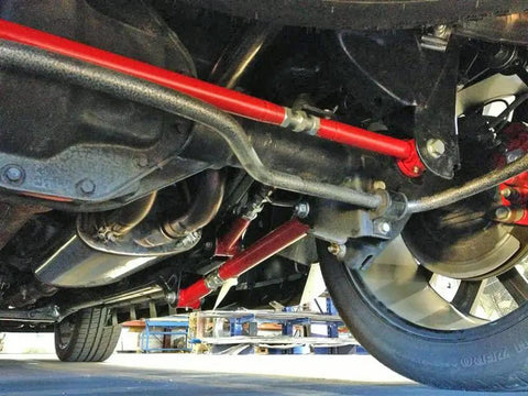 Adjustable Rear Panhard Track Bar With Polyurethane Bushings For 2009-2022 Dodge Ram 1500 Trucks Red Centers Rear Axle After Lift Or Lower Clears Bigger Tires 100 Percent Bolt In Install Beefed Up Heavy Duty Steel installed under rear axle