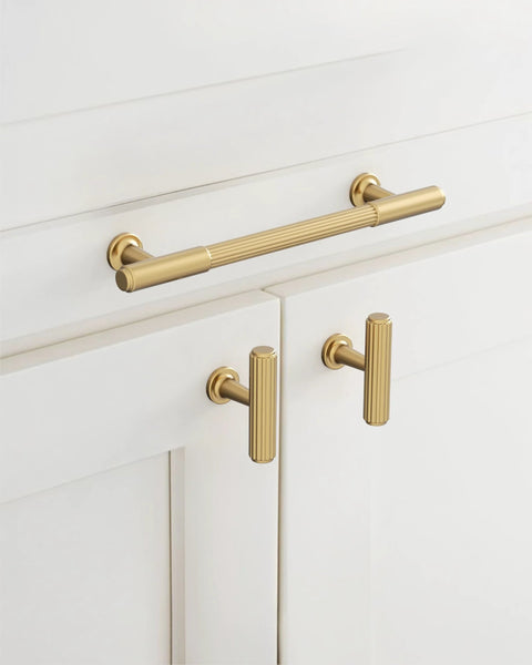 Champagne Bronze Cabinet Pulls 10 Pack 5 Inch Center To Center 6.6 Inch Overall Length installed on white cabinets