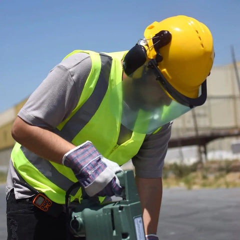 Worker wearing Pro Grade Forestry Chainsaw Safety Helmet With Face Shield And Earmuffs For Eye And Hearing Protection Hard Hat