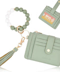 Green Wristlet Wallet For Women With RFID Blocking Card Holder Zipper Coin Pocket ID Window Detachable Slim Card Case Small Keychain Wallet On Silicone Beaded Bracelet Carabiner And Tassel For On The Go, showing the wallet, card holder, and bracelet.