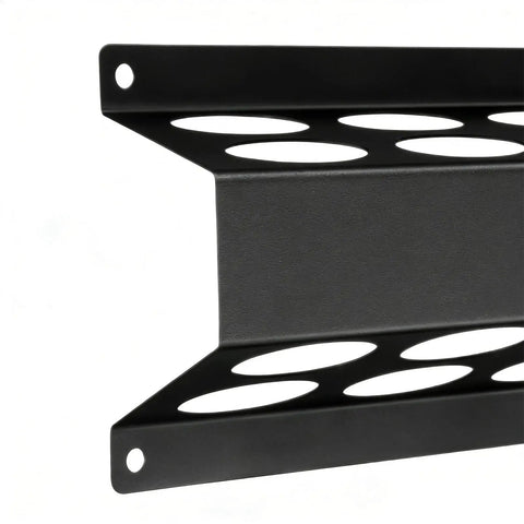 Close-up of metal wall-mounted welding storage rack with open slot design for welding rods