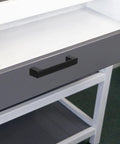 Vintage Zinc Alloy Cabinet Handles Matte Black for kitchen and dresser drawers, mounted on a gray furniture drawer, close-up view