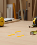 Self Drilling Wall Anchors Kit With Yellow Expansion Tubes on a workbench with tools, 200 Pieces Of High Impact Plastic For Hollow Walls