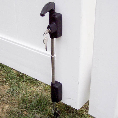 Lockable Security Drop Bolt For Wood And Vinyl Gates 24 Inch Length Prevents Dropping And Dragging With Retention Grooves Key Lockable Gate Bolt For Driveways And Commercial Use Industrial Strength Metal Replacement installed on a white gate.