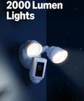 Front view of Ring Floodlight Cam Wired Plus outdoor security camera with dual white floodlights mounted on wall.
