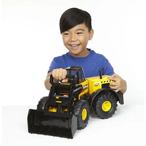 Child playing with Classic Steel Front End Loader Toy For Kids 3 And Up with Movable Front Loader and Durable Steel Construction.